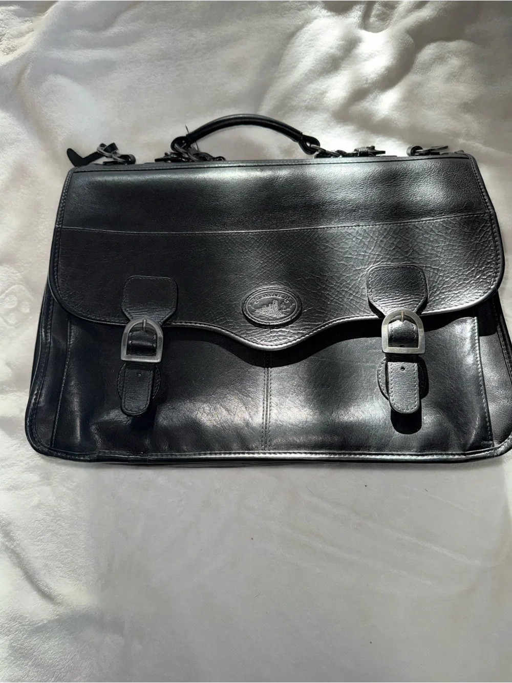 Santa Fe laptop flap briefcase is crafted from full-grain leather